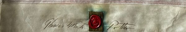 The red wax seal on the original parchment